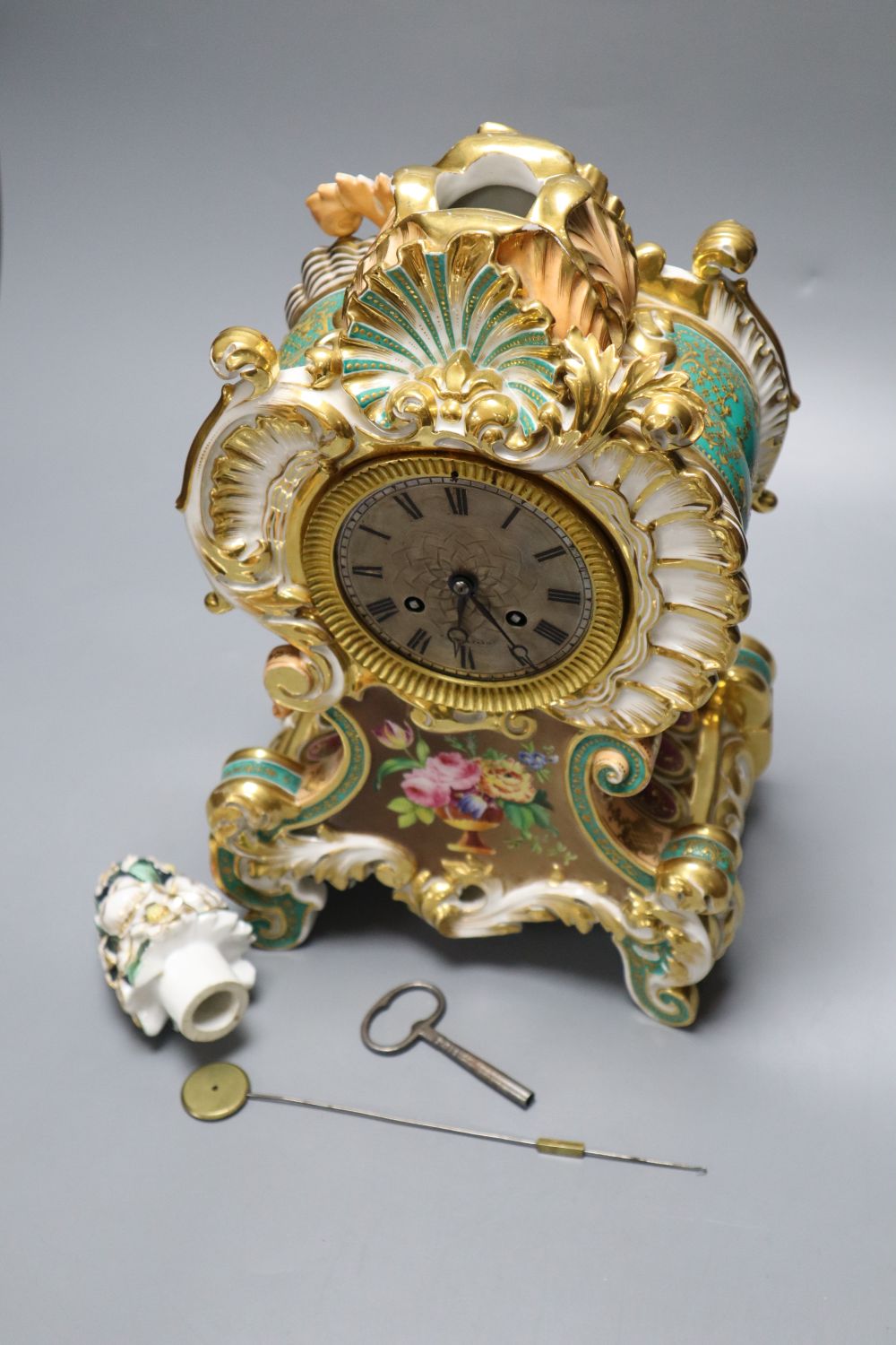 A late 19th century French porcelain mantel clock, with French movement, countwheel striking on a bell, height 40cm